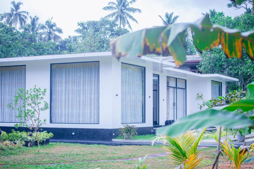 White villa building with garden